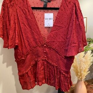 Red Ruffled Blouse with V-Neckline